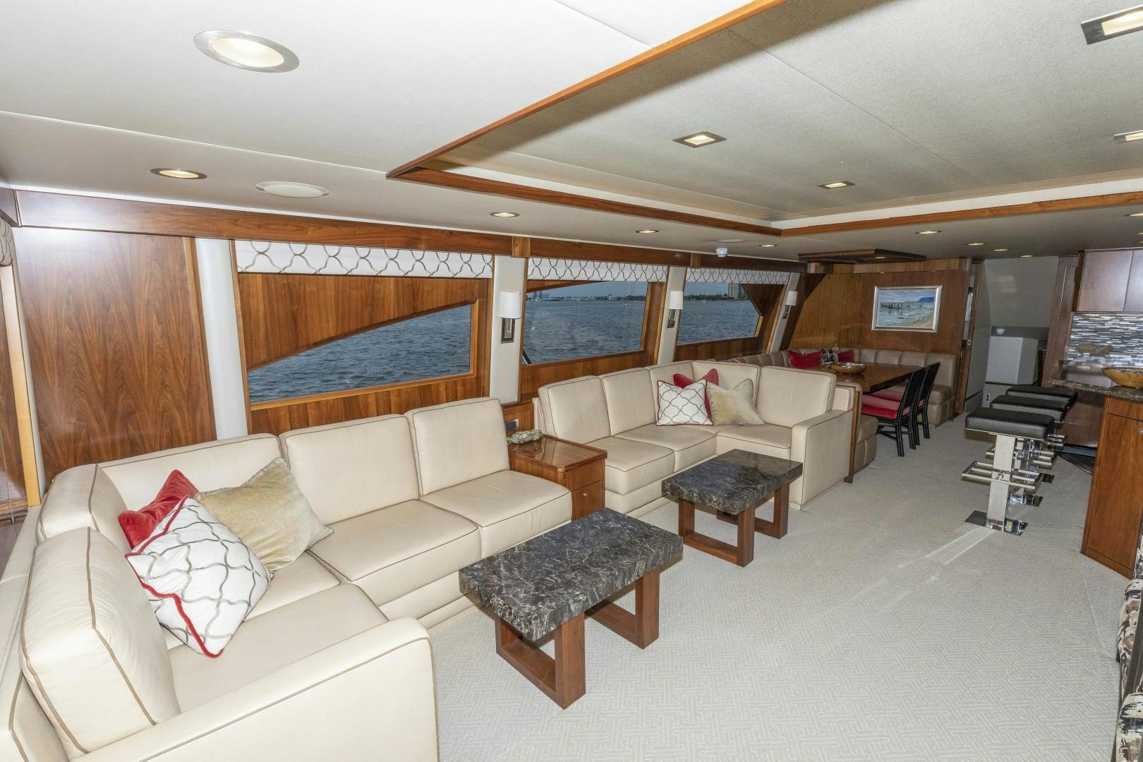a living room with a couch and a piano aboard BELLA DONA DI Yacht for Sale