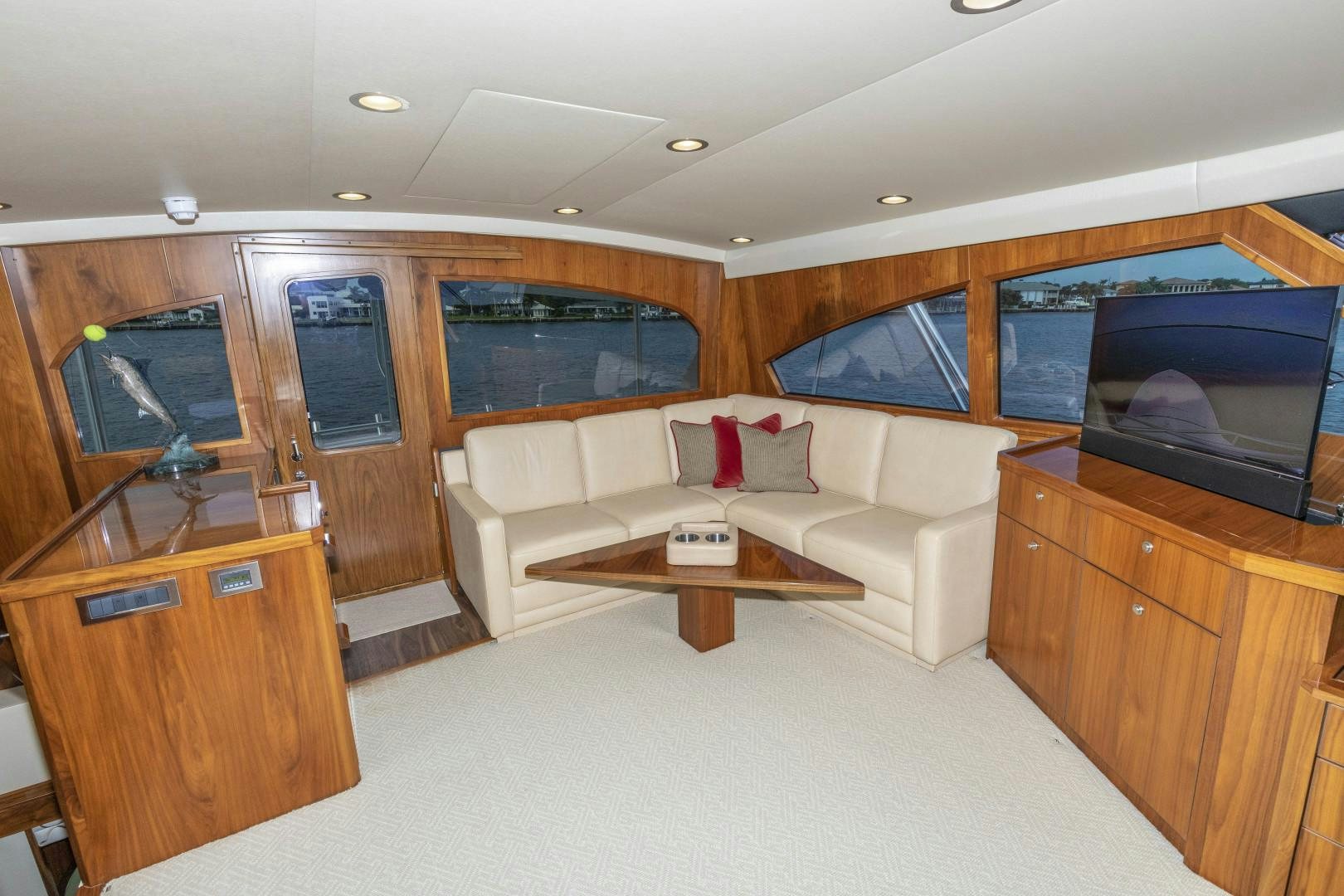 a living room with a couch and a tv aboard BELLA DONA DI Yacht for Sale