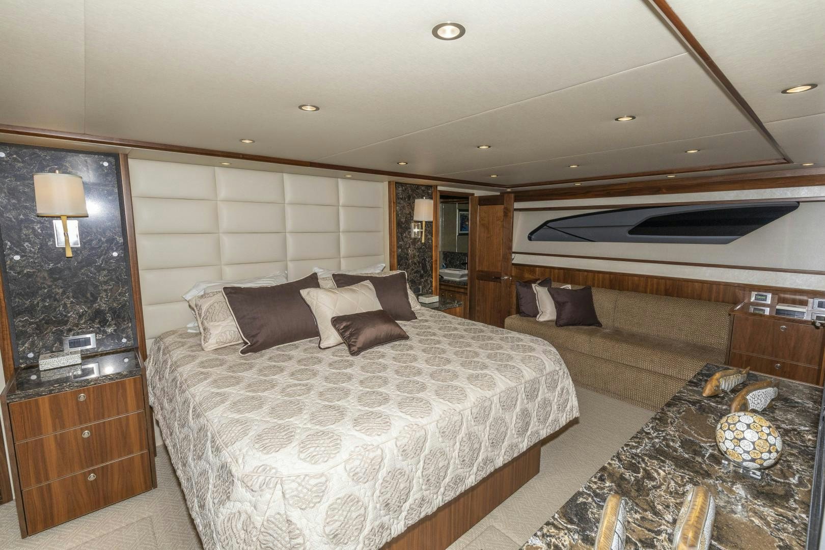 a large bedroom with a large bed aboard BELLA DONA DI Yacht for Sale
