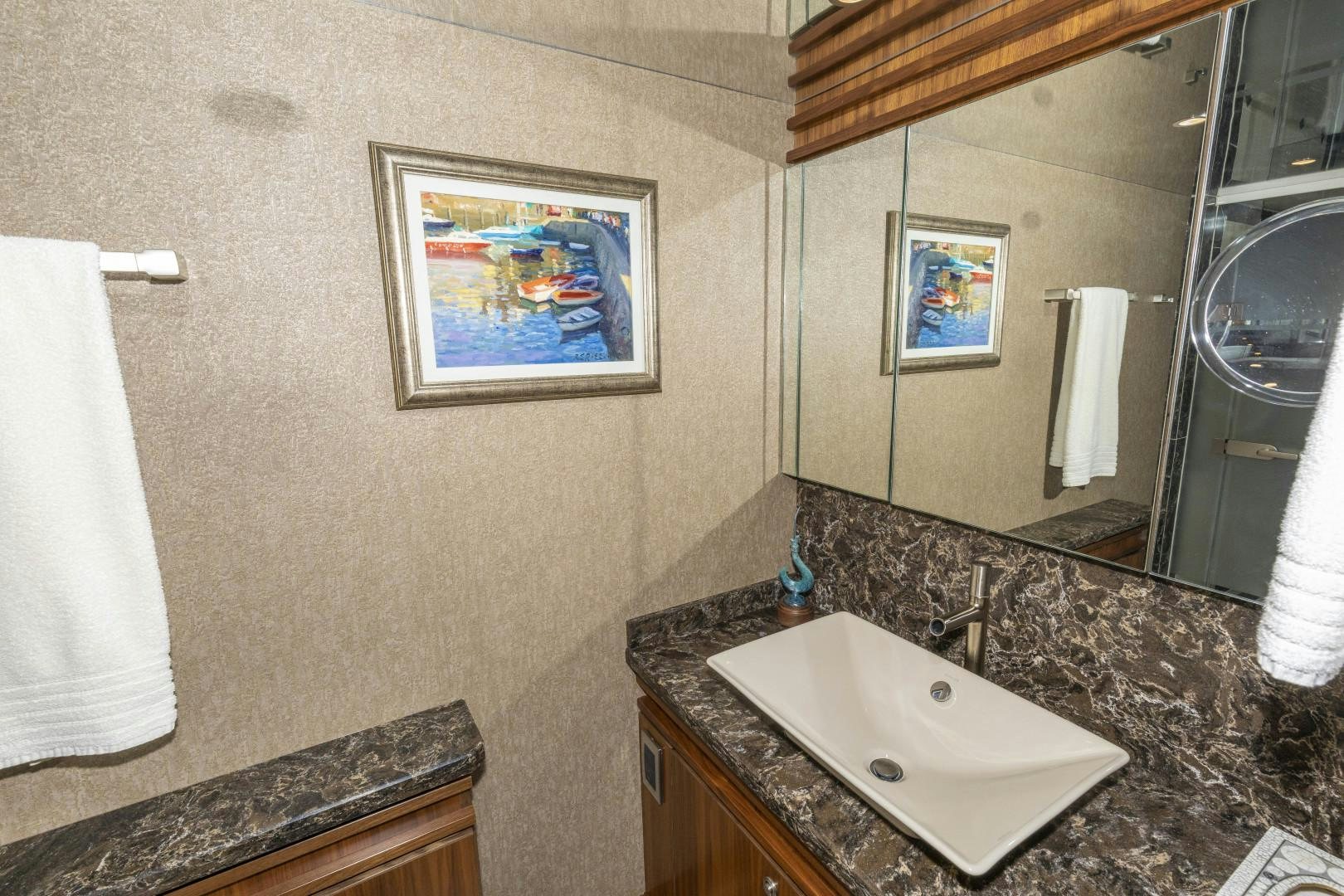 a bathroom with a marble countertop aboard BELLA DONA DI Yacht for Sale