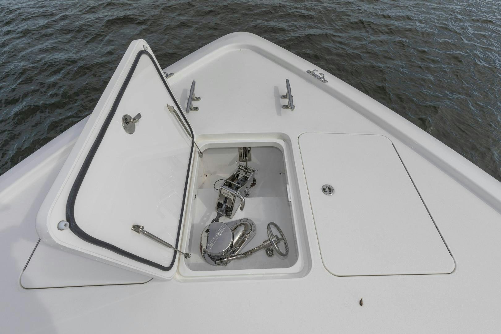 a white boat with a metal door aboard BELLA DONA DI Yacht for Sale