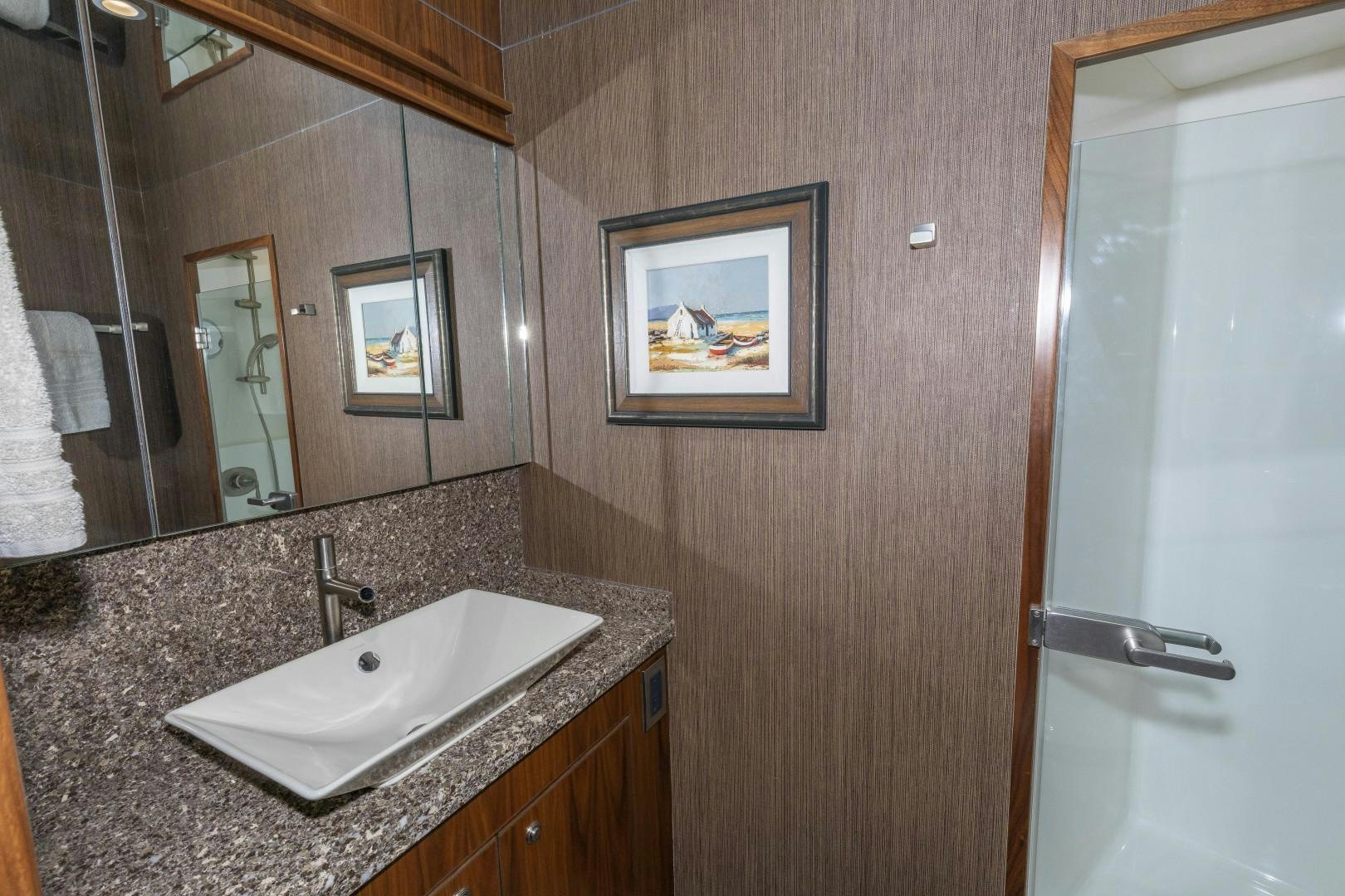 a bathroom with a marble counter top aboard BELLA DONA DI Yacht for Sale
