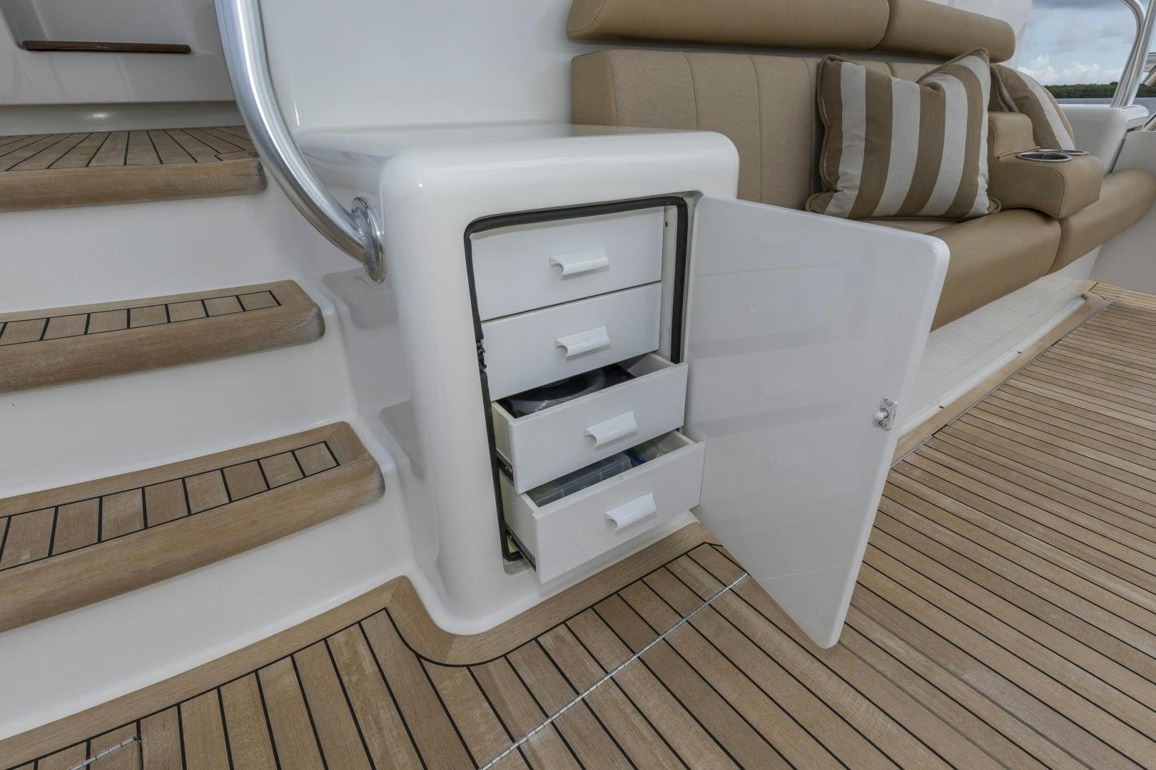 a white couch and a white shelf aboard BELLA DONA DI Yacht for Sale