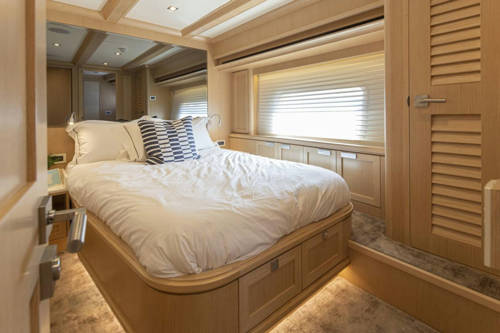 a bed in a room aboard PARAGON COCKPIT Yacht for Sale