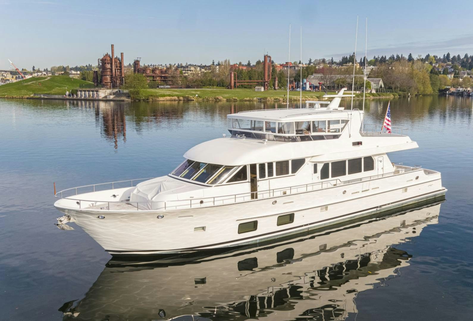 a large white boat on the water aboard PARAGON COCKPIT Yacht for Sale