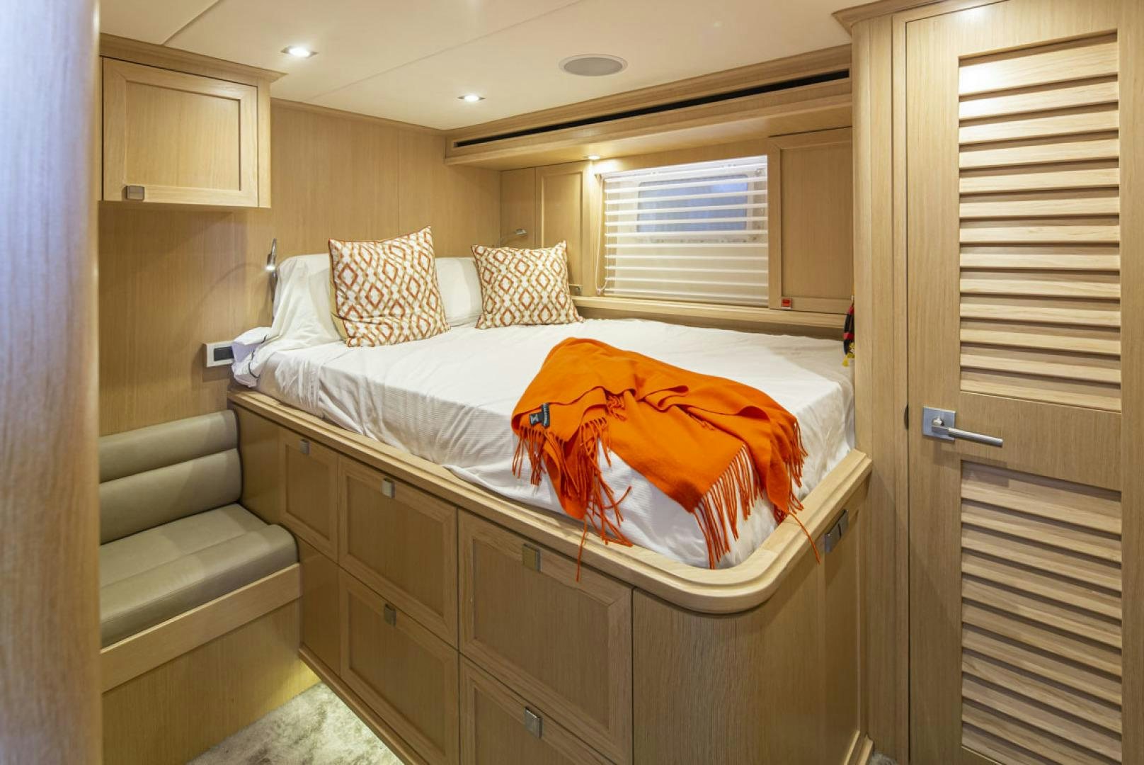 a bed in a room aboard PARAGON COCKPIT Yacht for Sale
