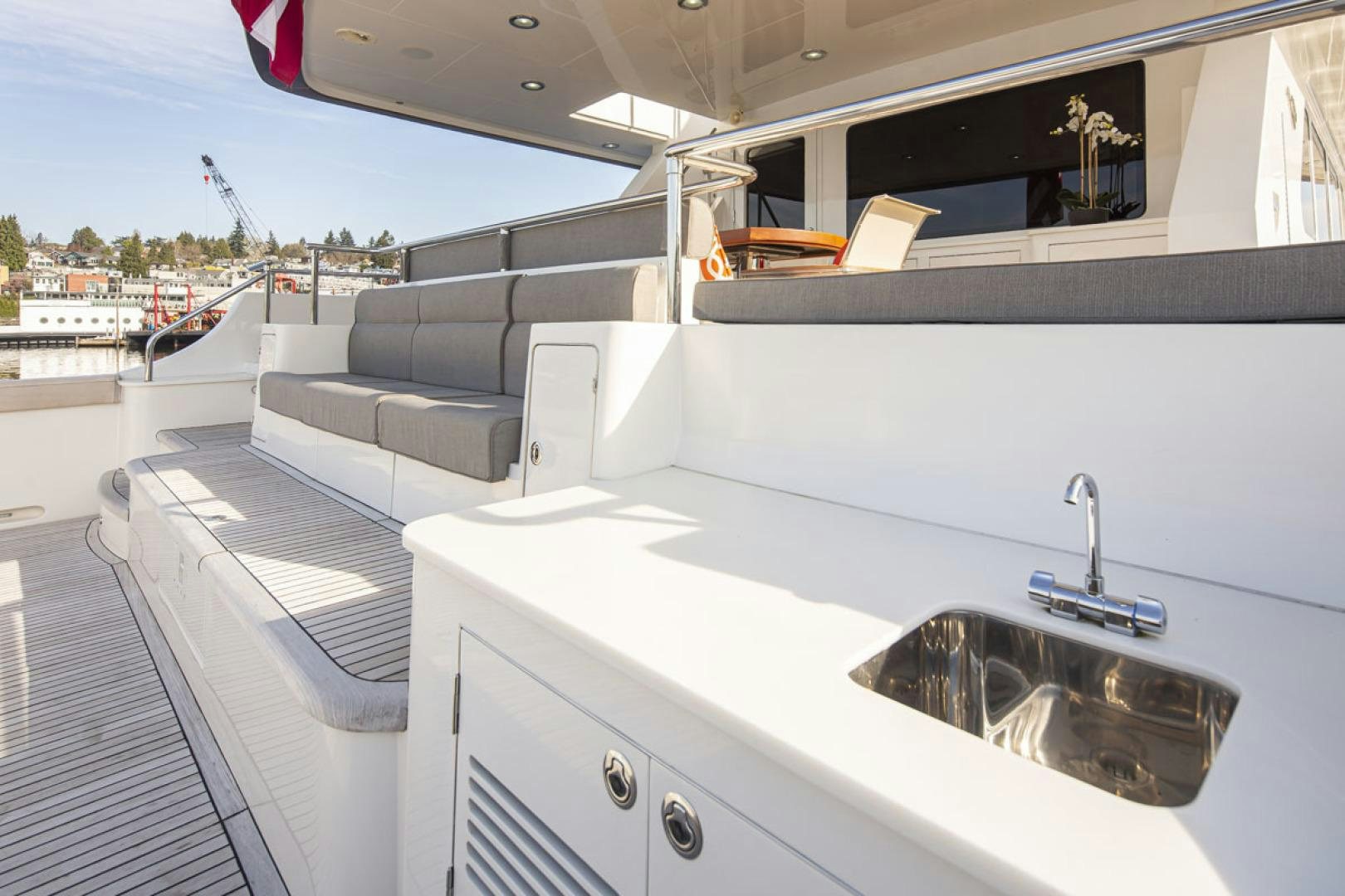 a large white boat with a sink aboard PARAGON COCKPIT Yacht for Sale