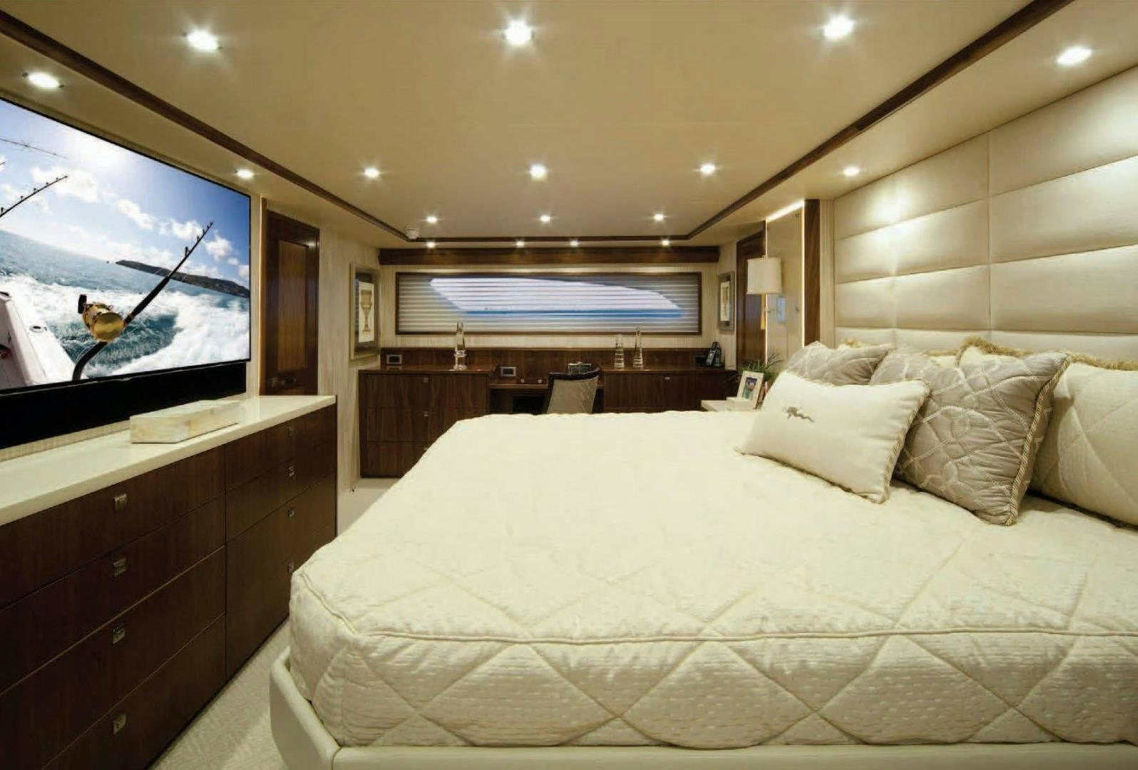 a bed with white sheets aboard 2022 Yacht for Sale