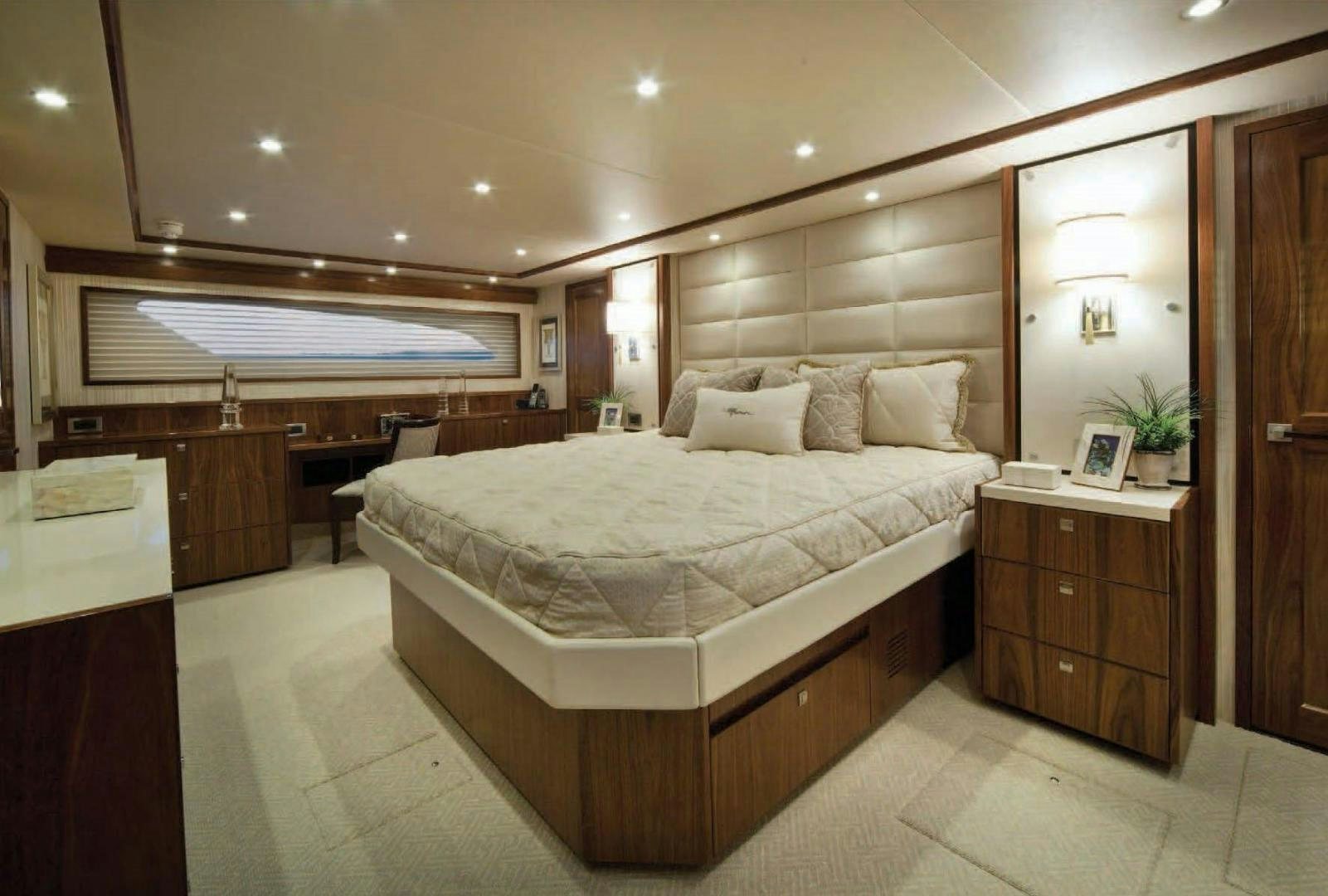 a large bedroom with a large bed aboard 2022 Yacht for Sale