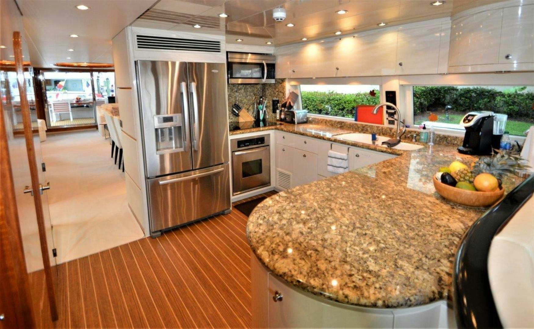 a kitchen with a stainless steel refrigerator aboard NO NAME Yacht for Sale