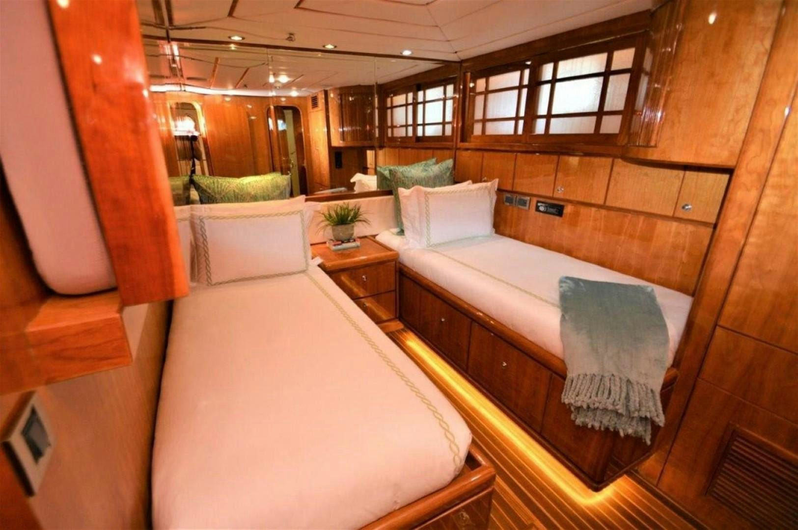 a room with a bed and a chair aboard NO NAME Yacht for Sale