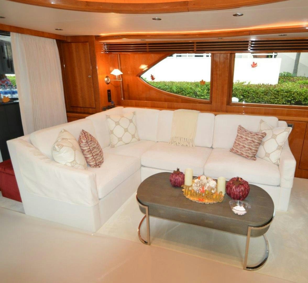 a living room with a couch and a table aboard NO NAME Yacht for Sale