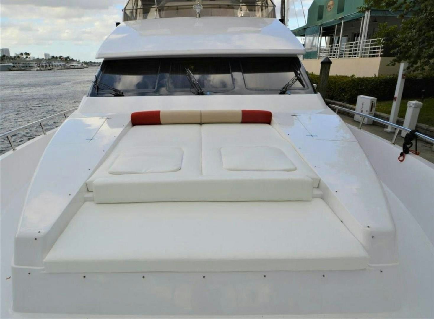 a white boat on a dock aboard NO NAME Yacht for Sale