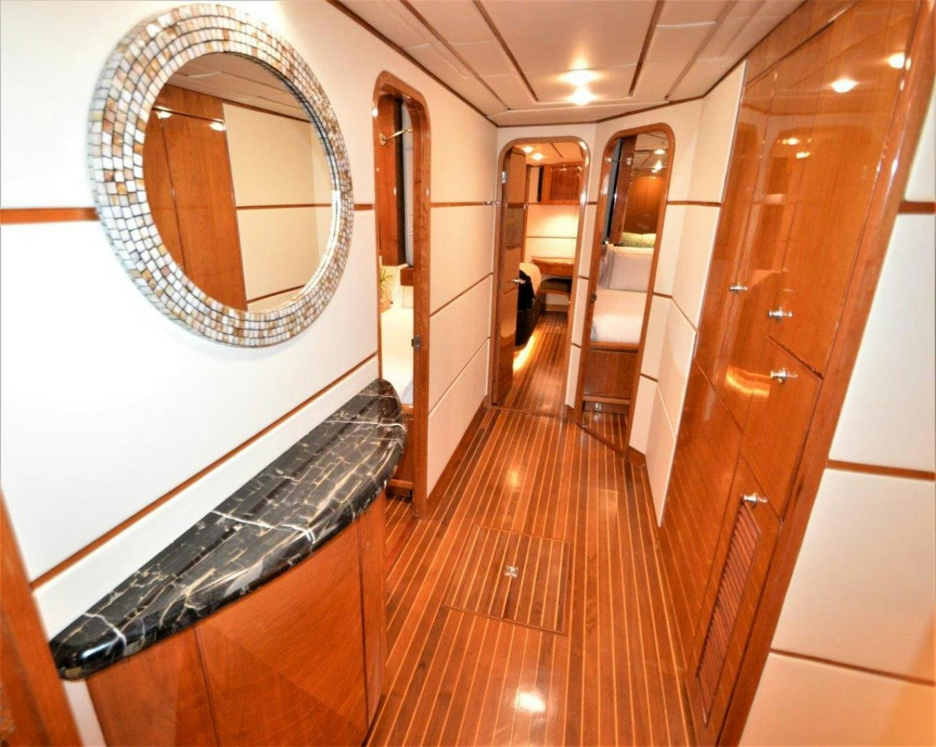 a hallway with a large mirror aboard NO NAME Yacht for Sale