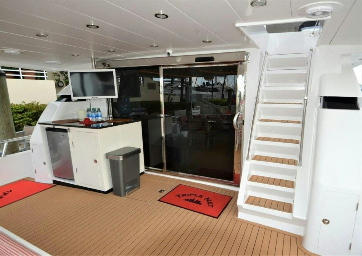 a room with a large glass door and a large window aboard NO NAME Yacht for Sale