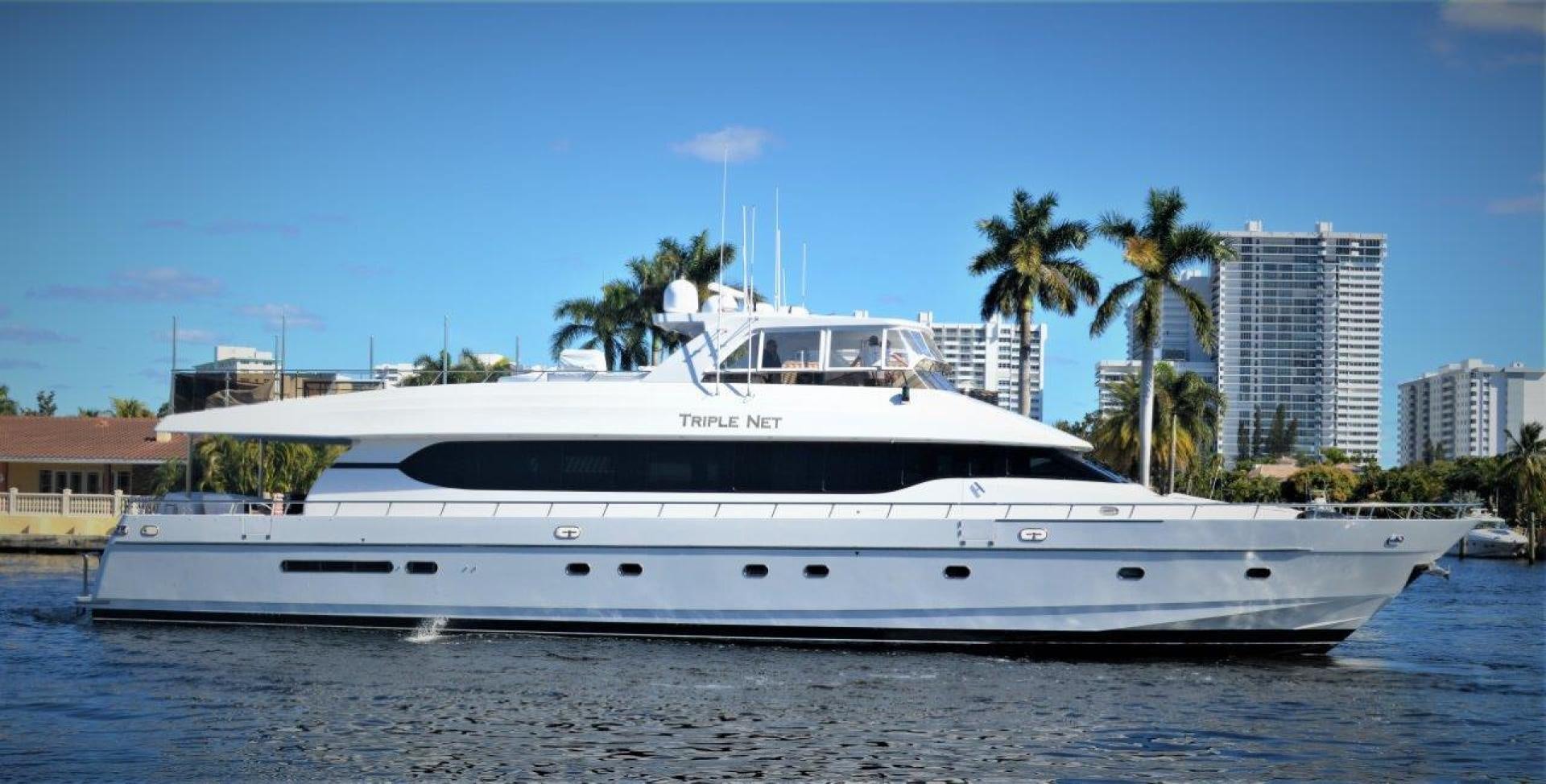 a white yacht on the water aboard No Name Yacht for Sale