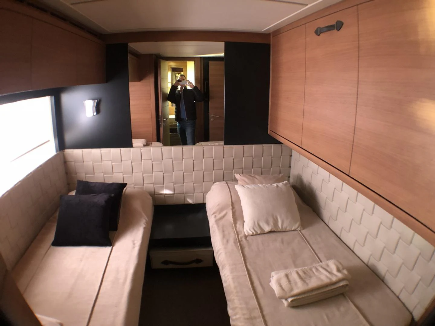 a room with couches and a person standing in the doorway aboard DORIS Yacht for Sale