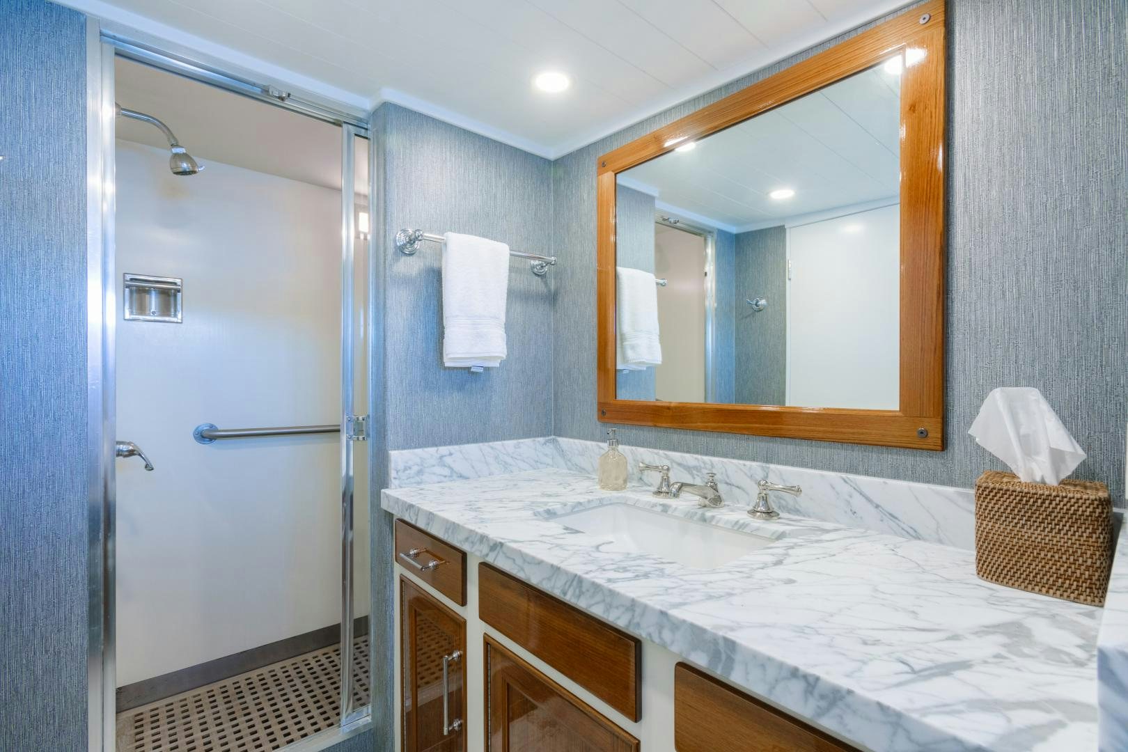 a bathroom with a large mirror aboard NORDIC STAR Yacht for Sale