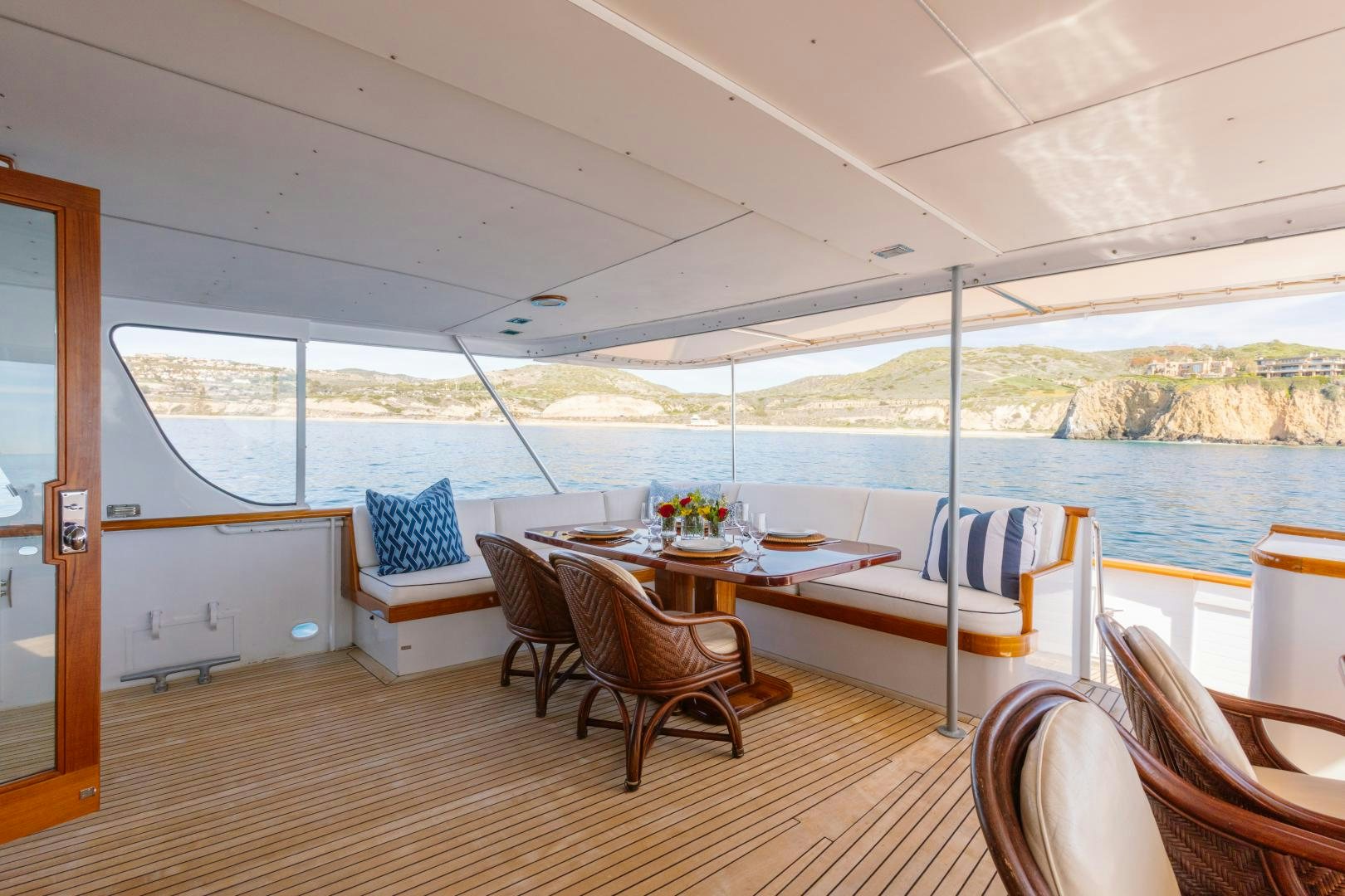 a room with a table and chairs aboard NORDIC STAR Yacht for Sale