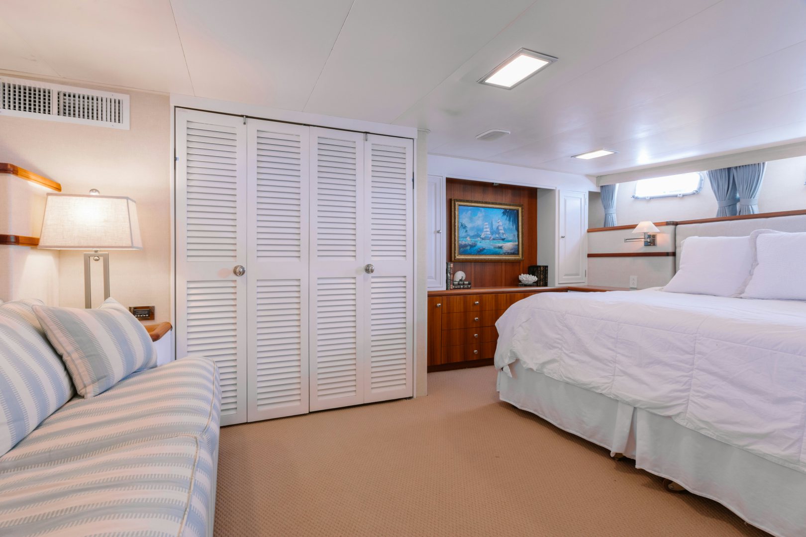 a bedroom with a bed and a television aboard NORDIC STAR Yacht for Sale