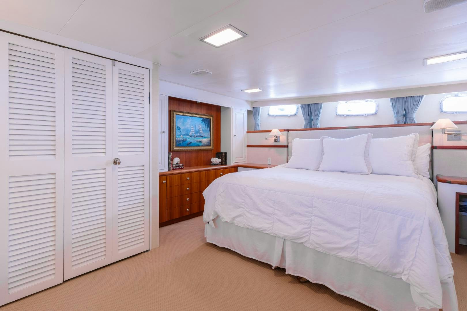a bedroom with a bed and a television aboard NORDIC STAR Yacht for Sale