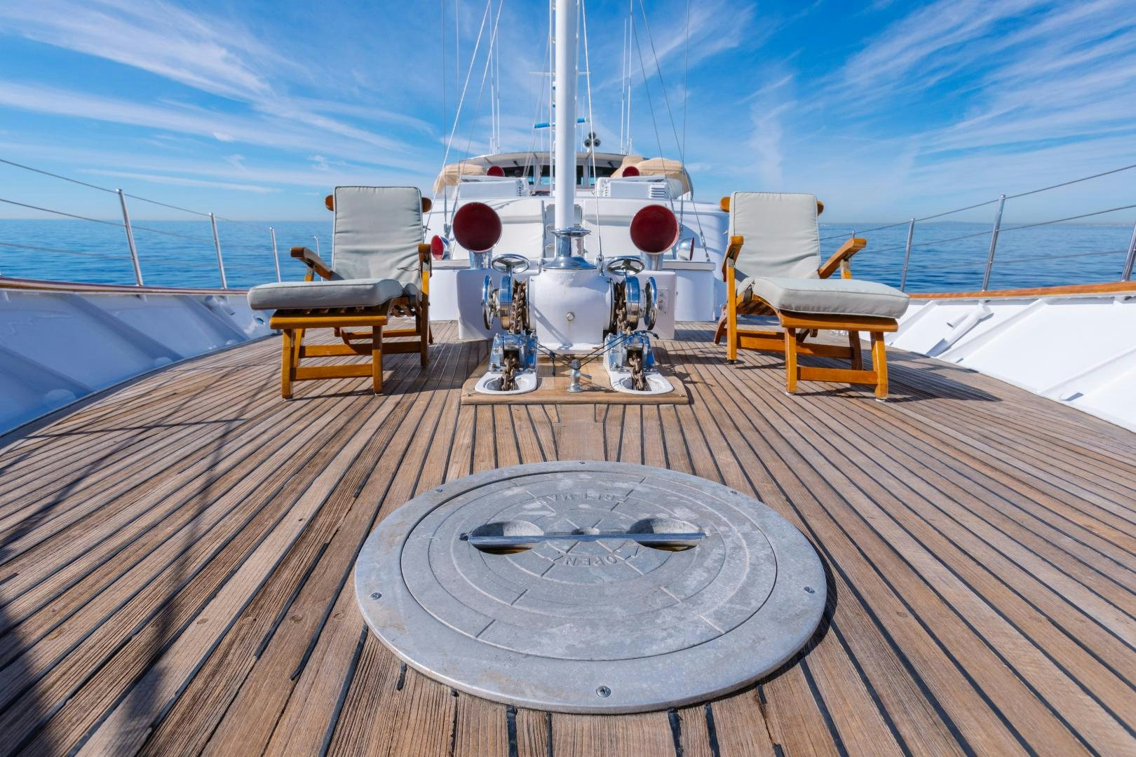 a deck with a record player and chairs on it aboard NORDIC STAR Yacht for Sale