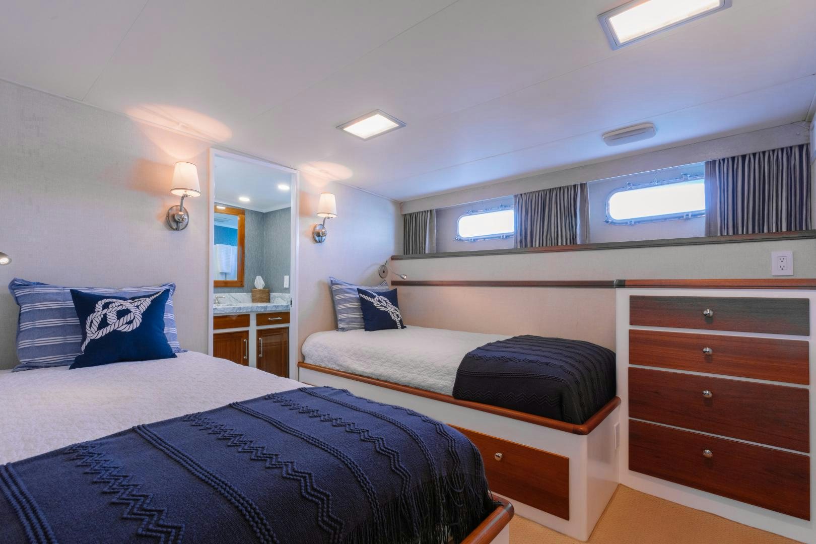 a couple of beds in a hotel room aboard NORDIC STAR Yacht for Sale