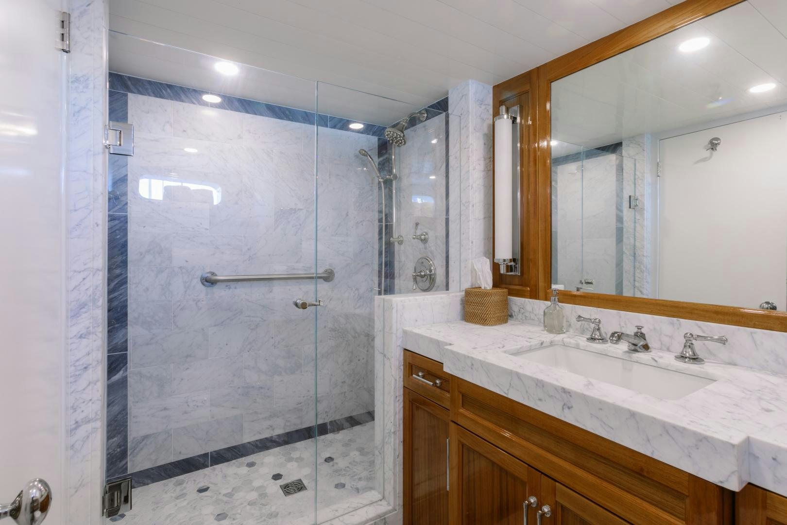 a bathroom with a shower and sink aboard NORDIC STAR Yacht for Sale