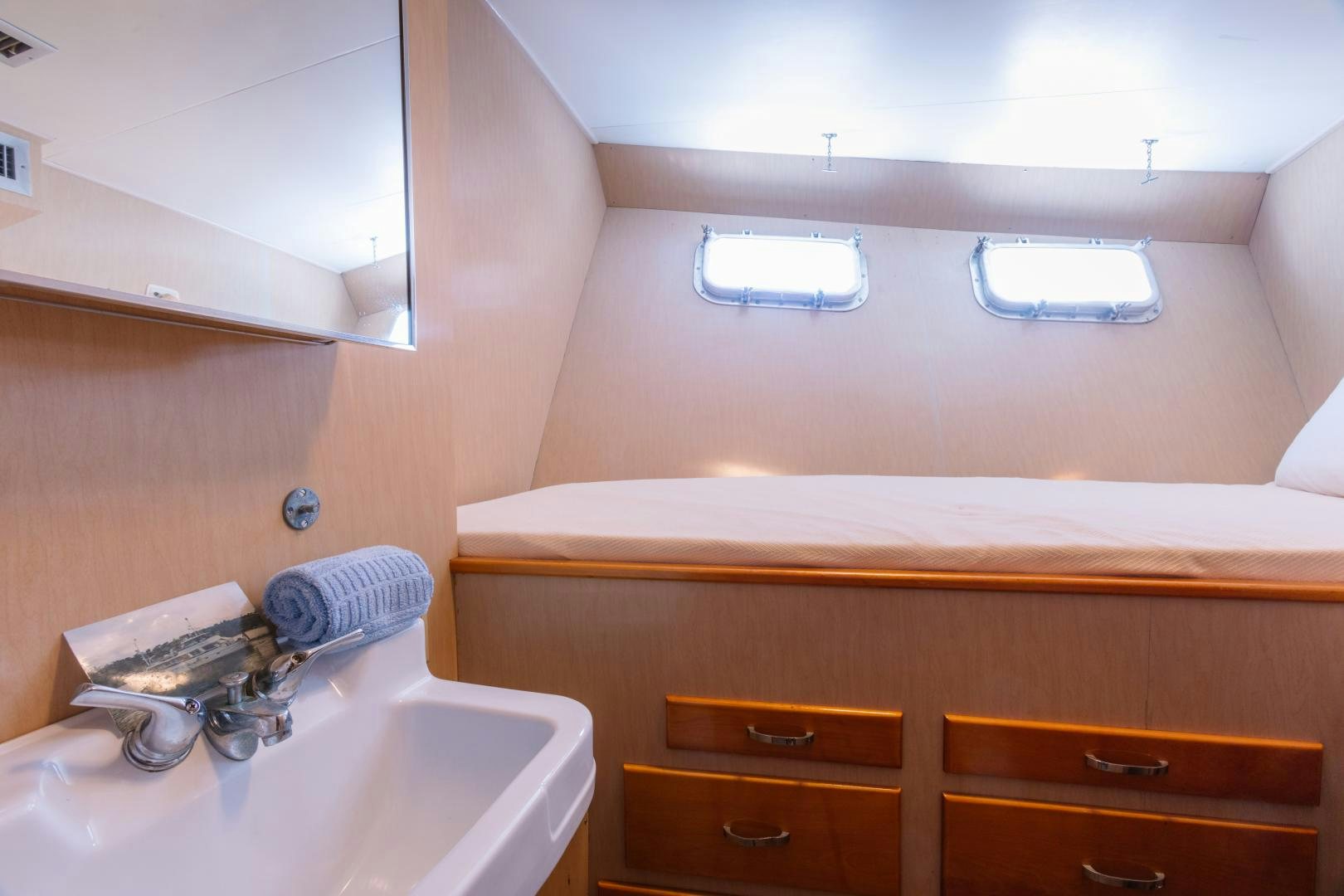 a bathroom with a sink and cabinets aboard NORDIC STAR Yacht for Sale