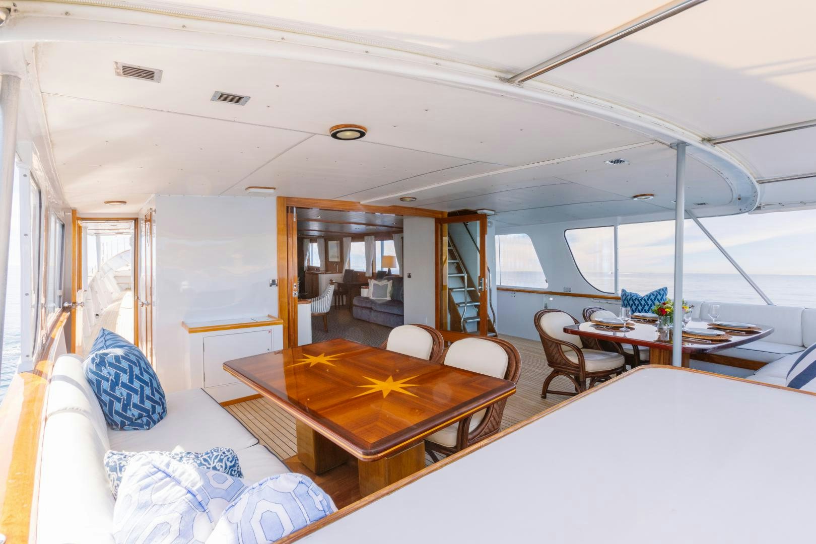 a room with a table and chairs aboard NORDIC STAR Yacht for Sale