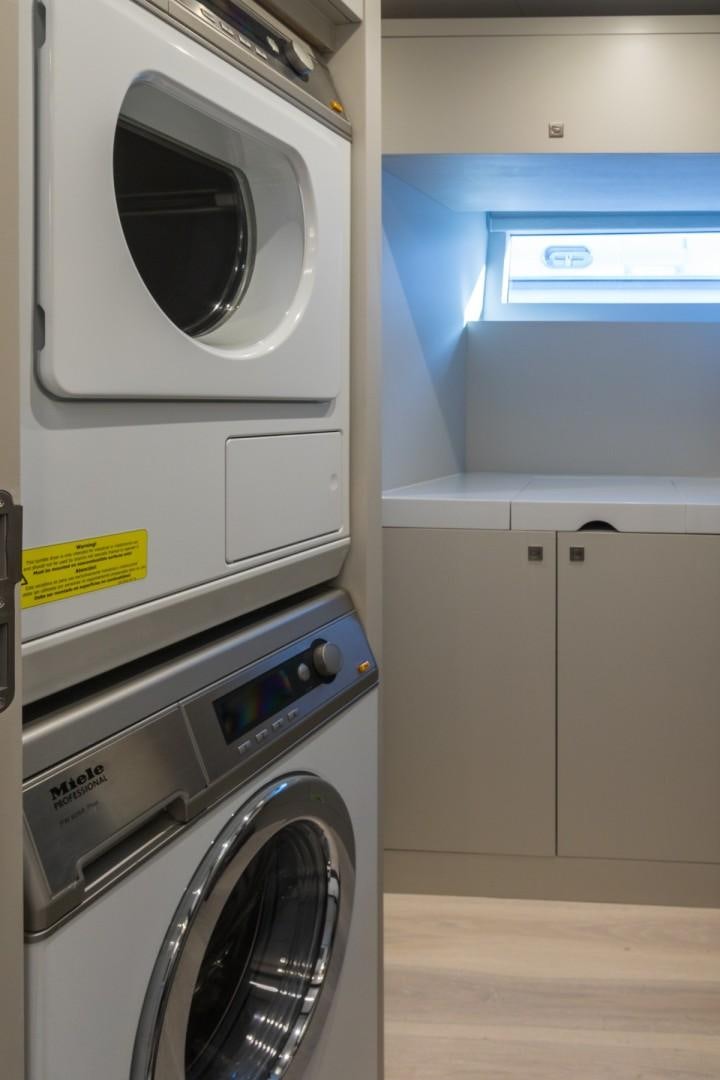 a row of washing machines aboard No Name Yacht for Sale