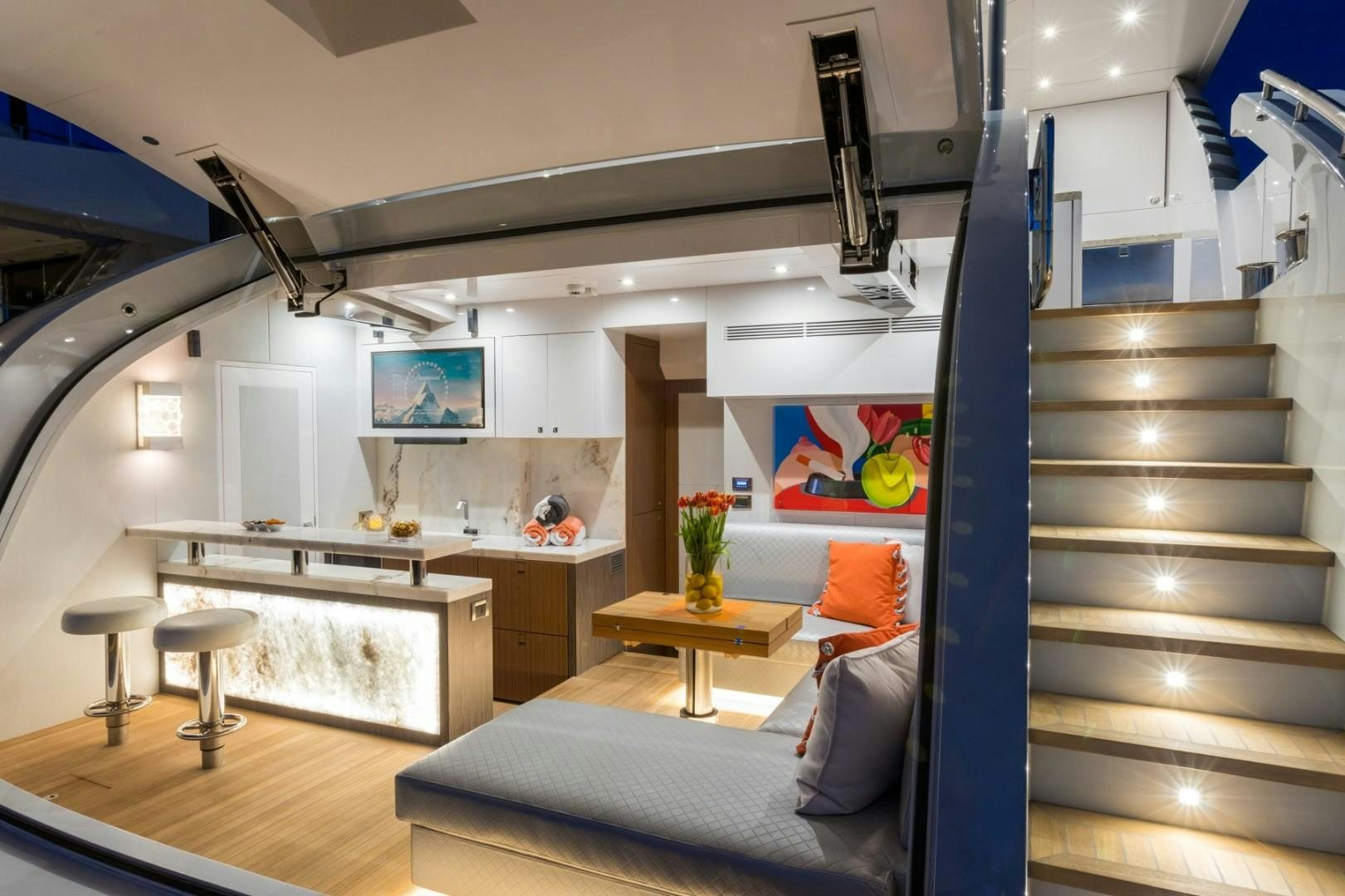 a modern looking living room aboard No Name Yacht for Sale