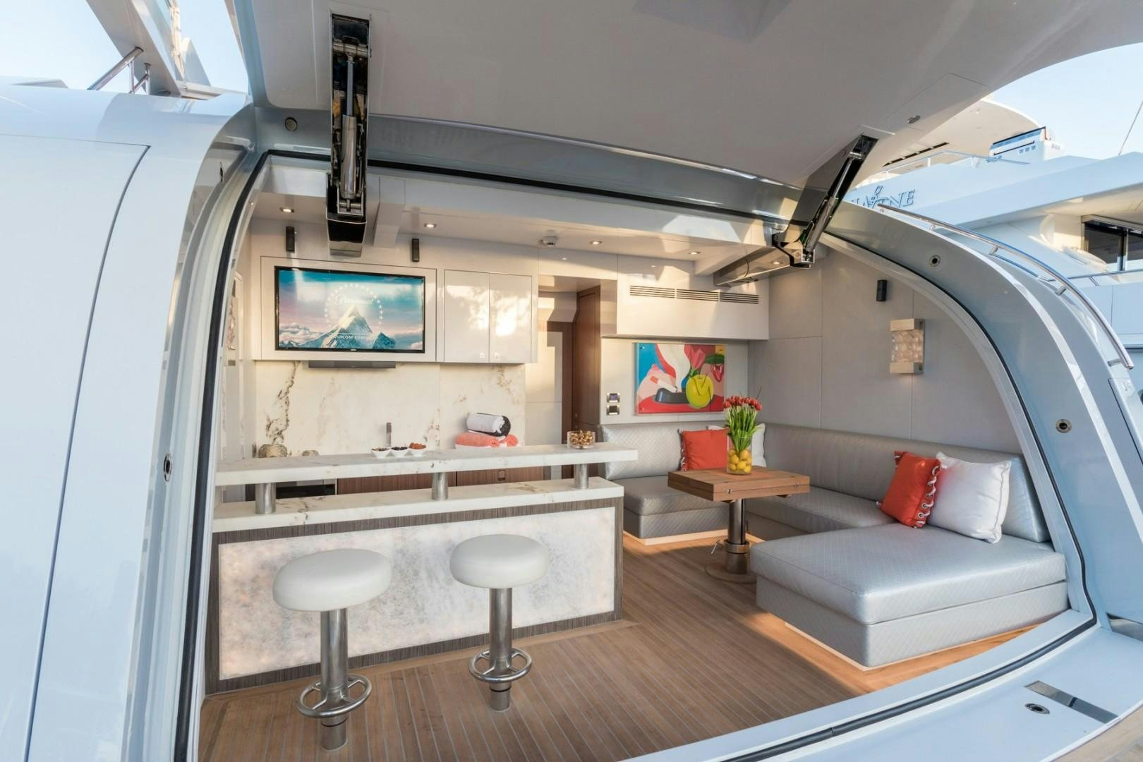 a modern looking living room aboard No Name Yacht for Sale