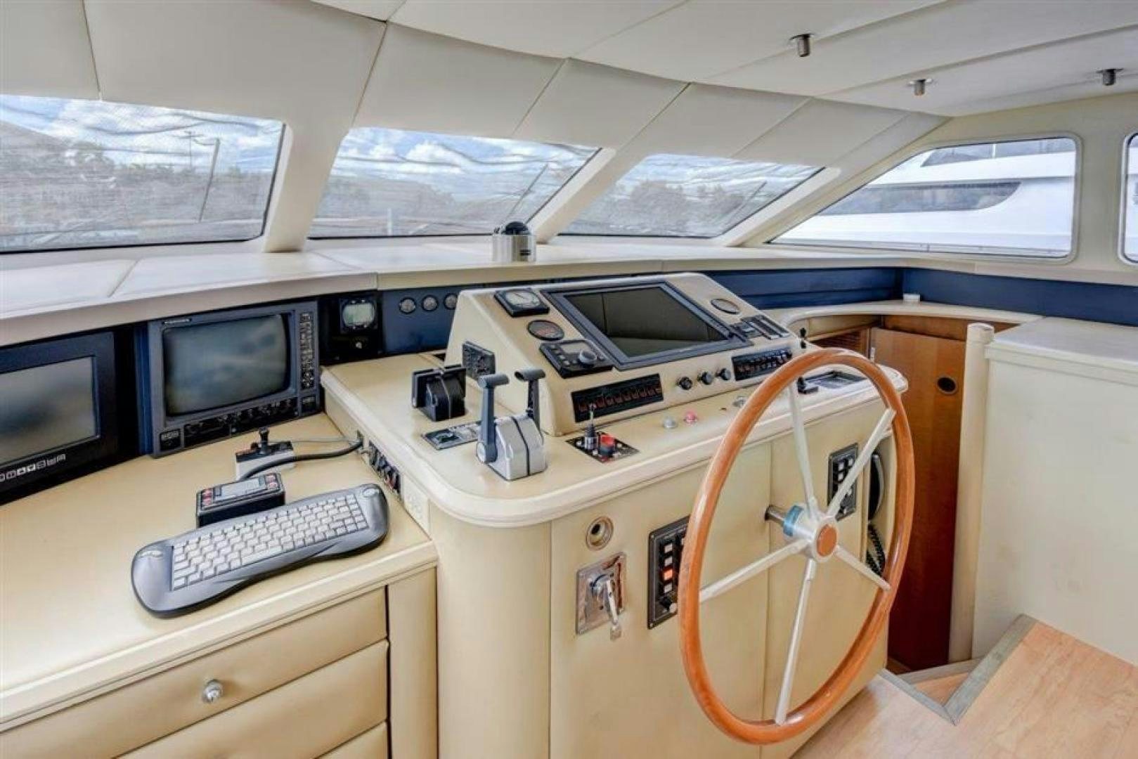 a room with computers and other electronics aboard LUCKY STAR Yacht for Sale