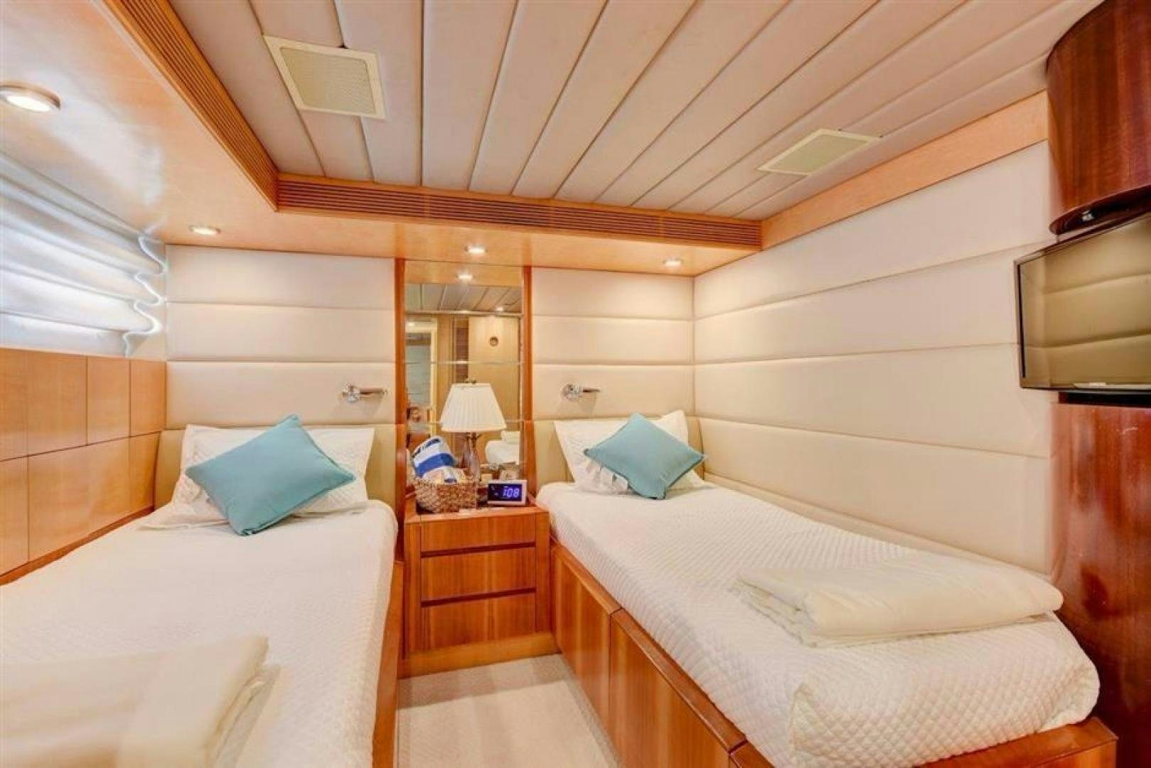 a room with two beds aboard LUCKY STAR Yacht for Sale