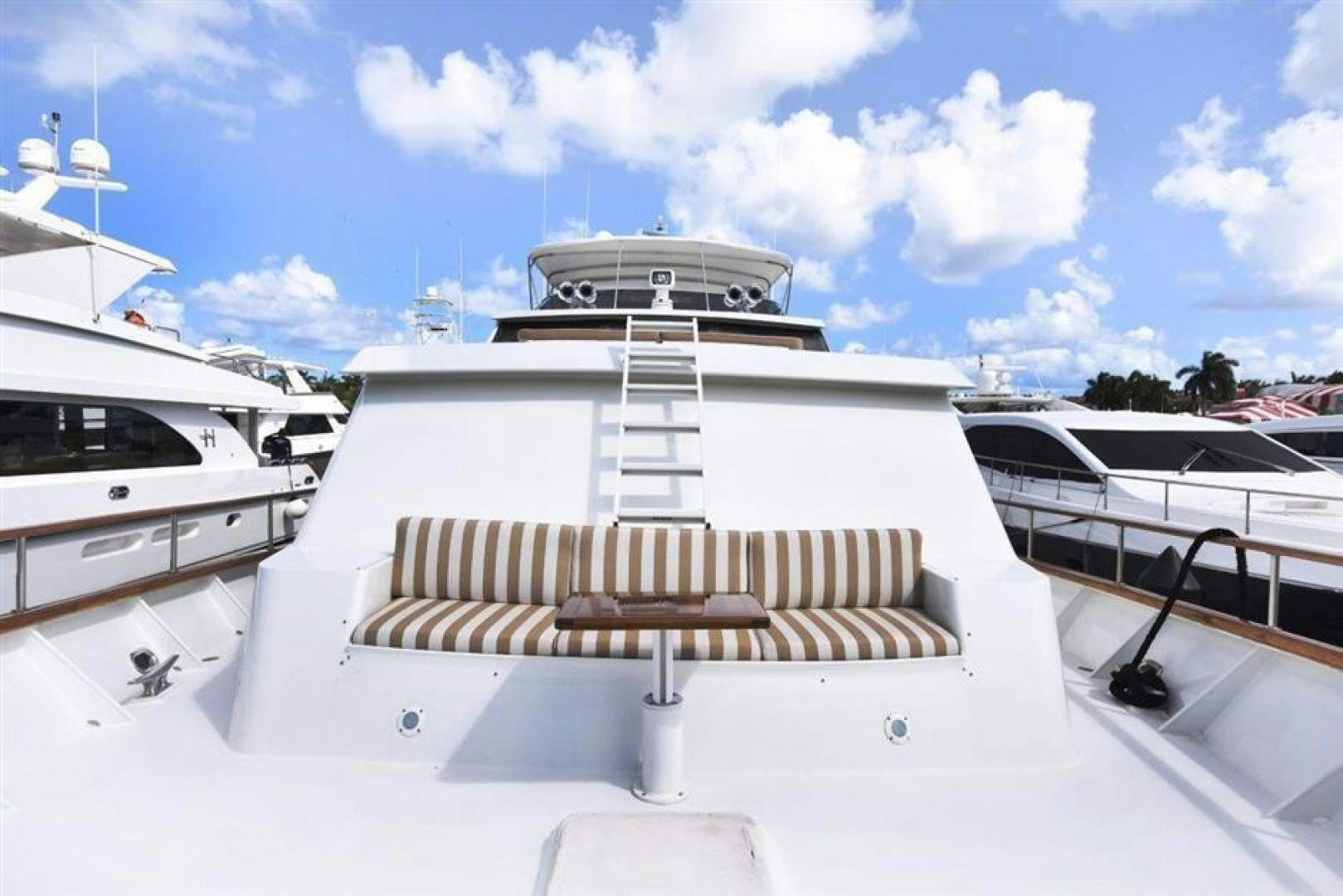 a white boat with a white roof aboard LUCKY STAR Yacht for Sale