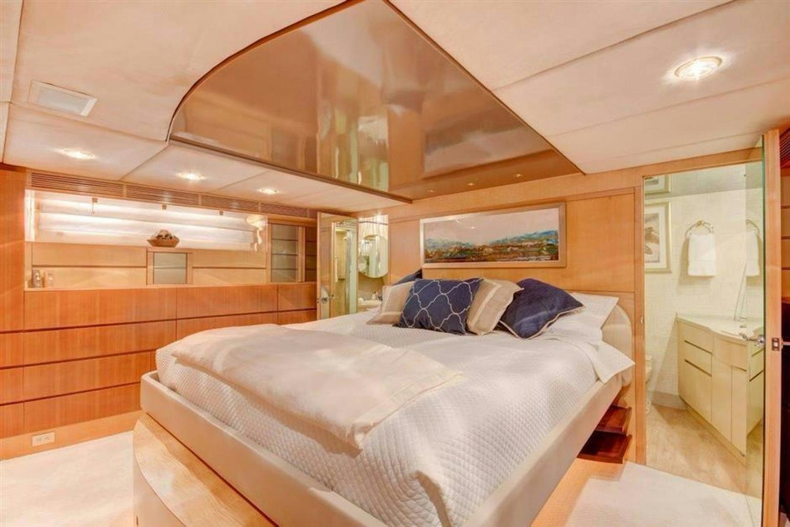 a bed in a room aboard LUCKY STAR Yacht for Sale