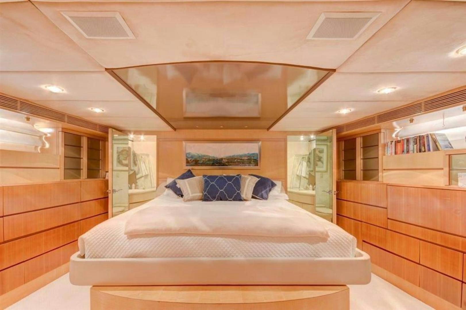 a bed in a room aboard LUCKY STAR Yacht for Sale