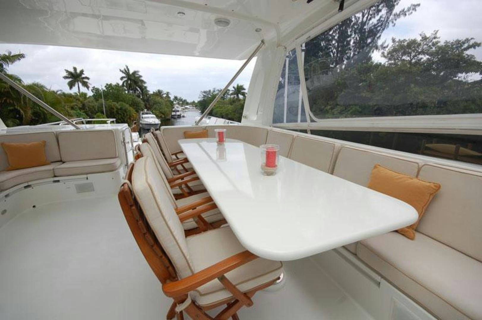 a table with chairs on it aboard SELF MADE Yacht for Sale