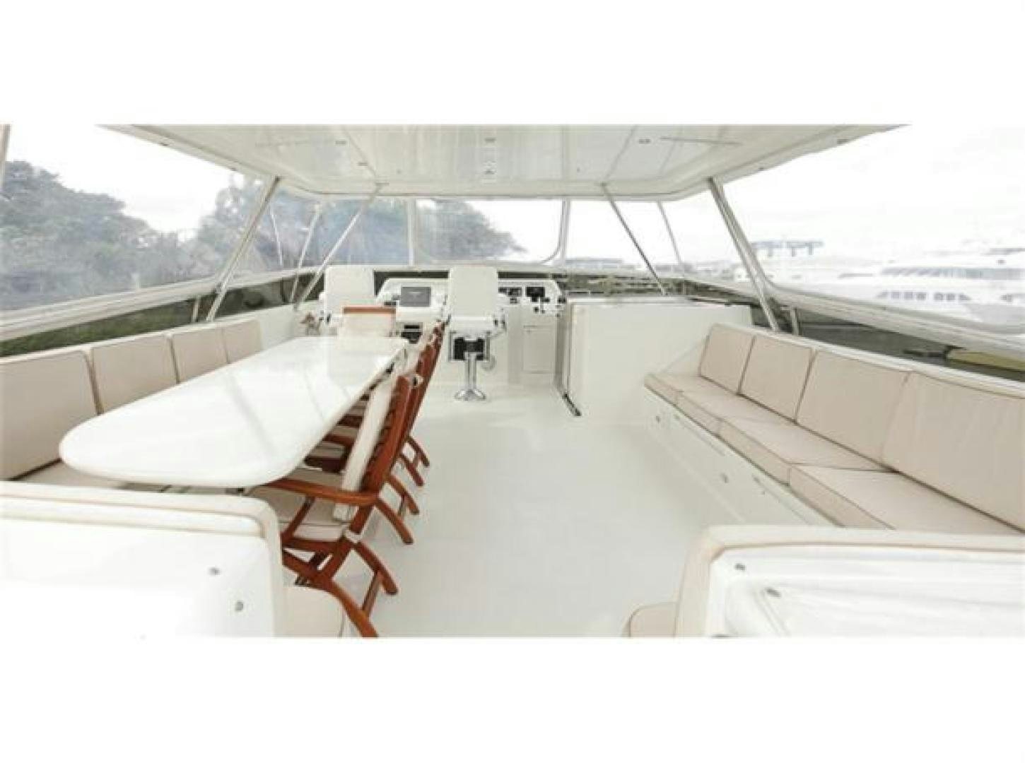 a group of chairs on a deck aboard SELF MADE Yacht for Sale