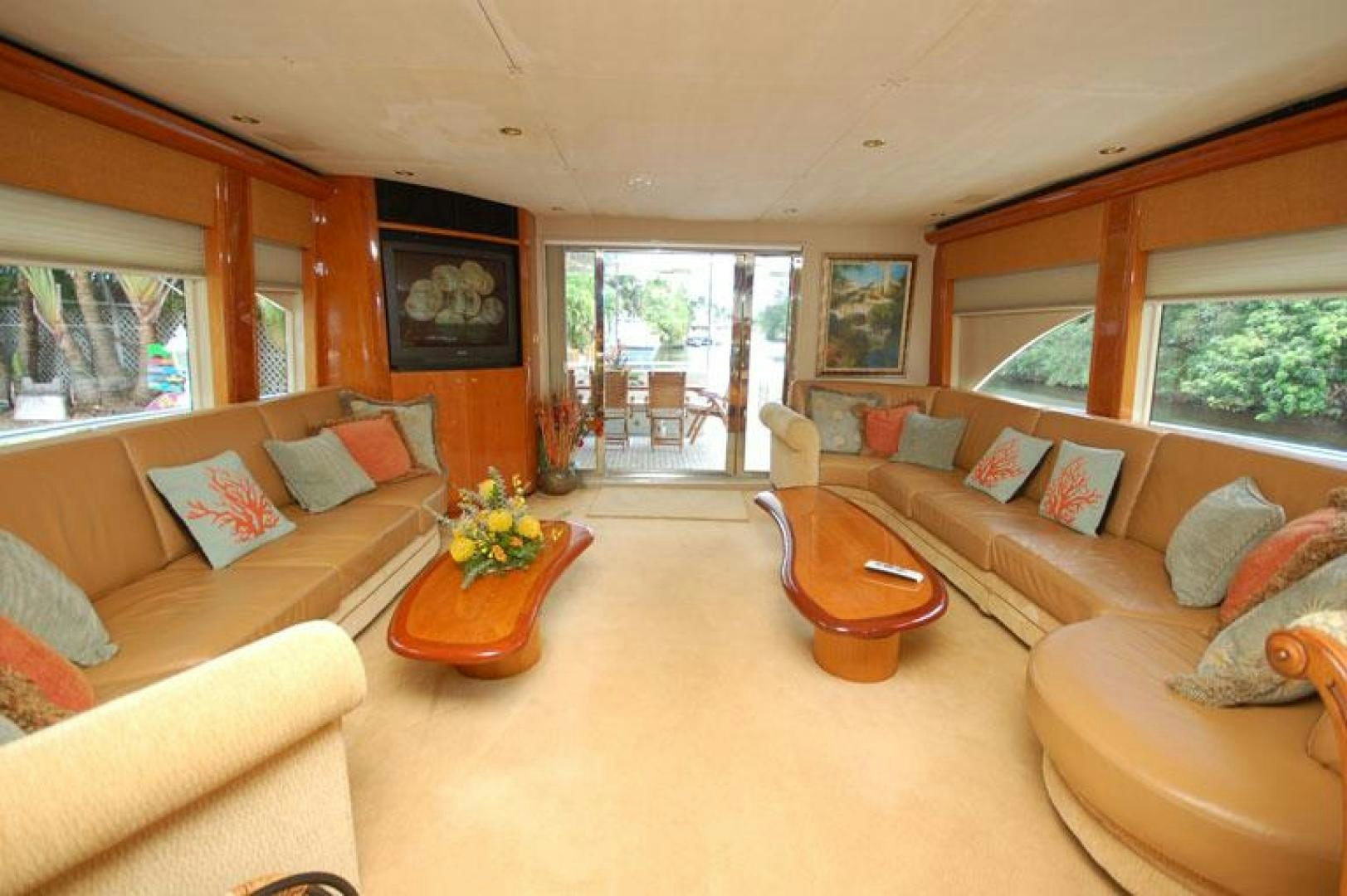 a living room with a couch and a table aboard SELF MADE Yacht for Sale