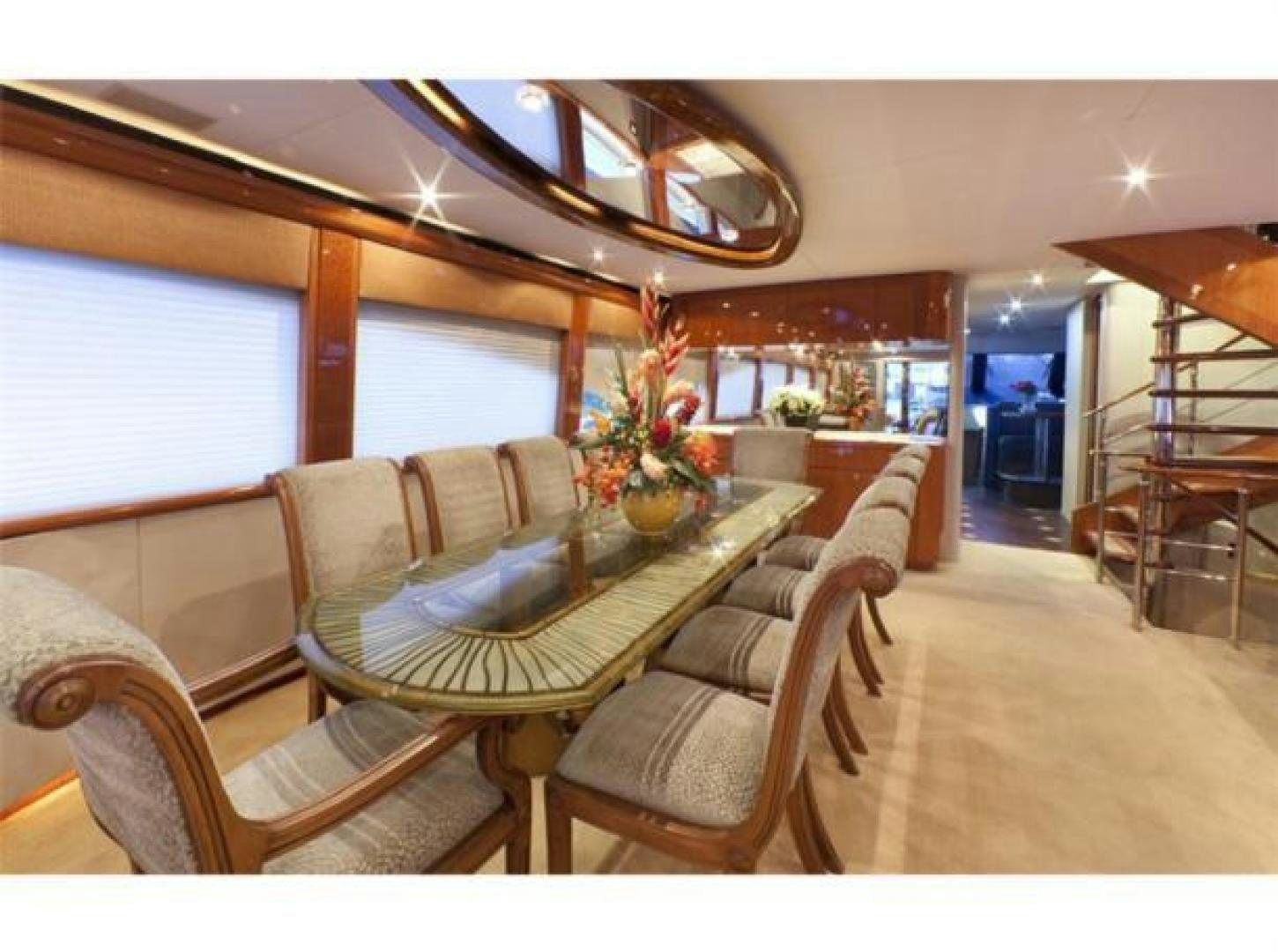 a room with chairs and a table aboard SELF MADE Yacht for Sale