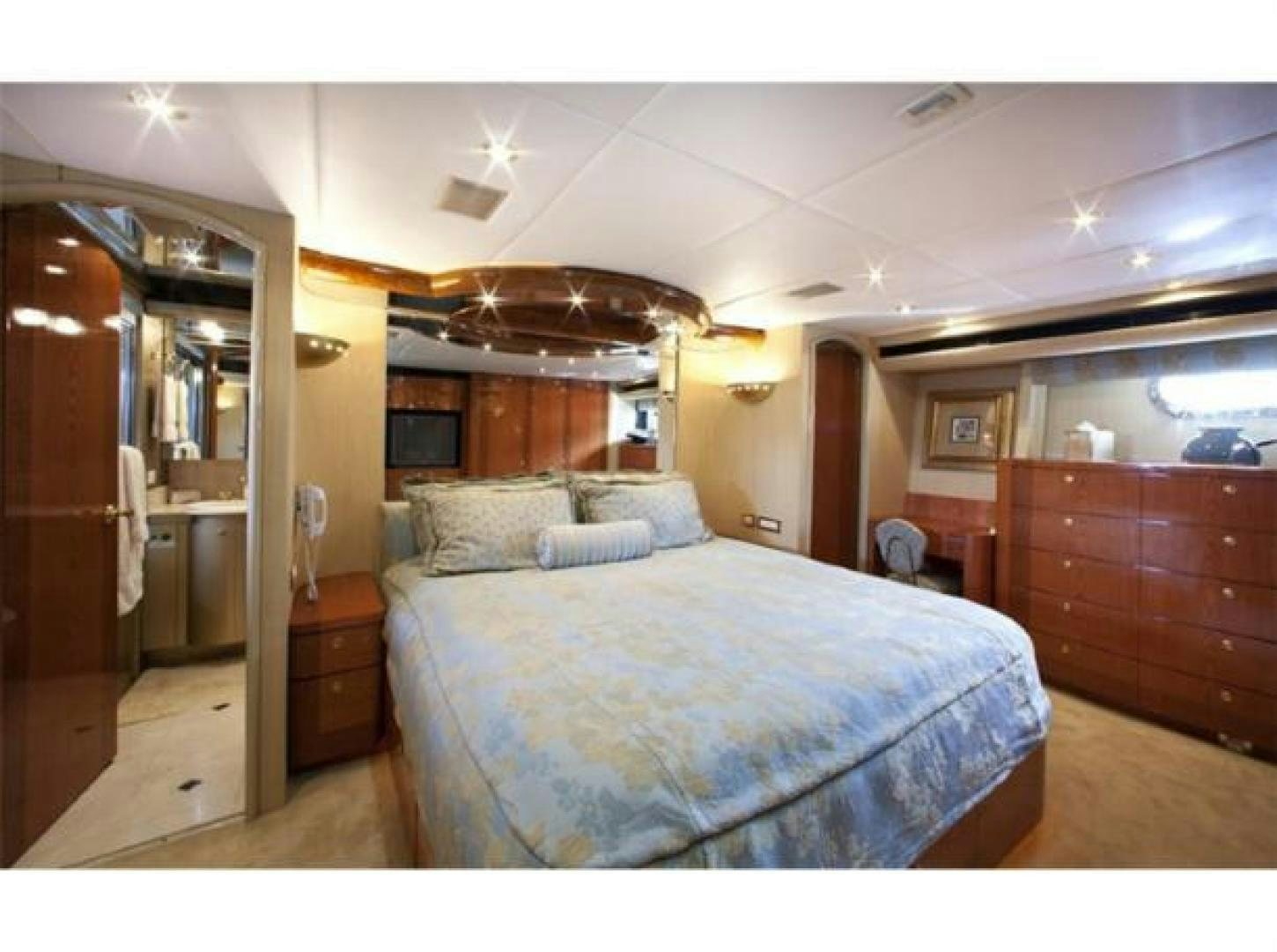 a bedroom with a bed and a door aboard SELF MADE Yacht for Sale
