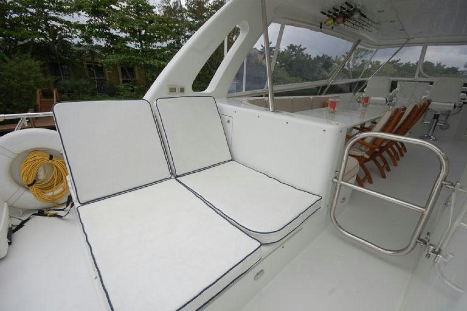 a white car with a door open aboard SELF MADE Yacht for Sale