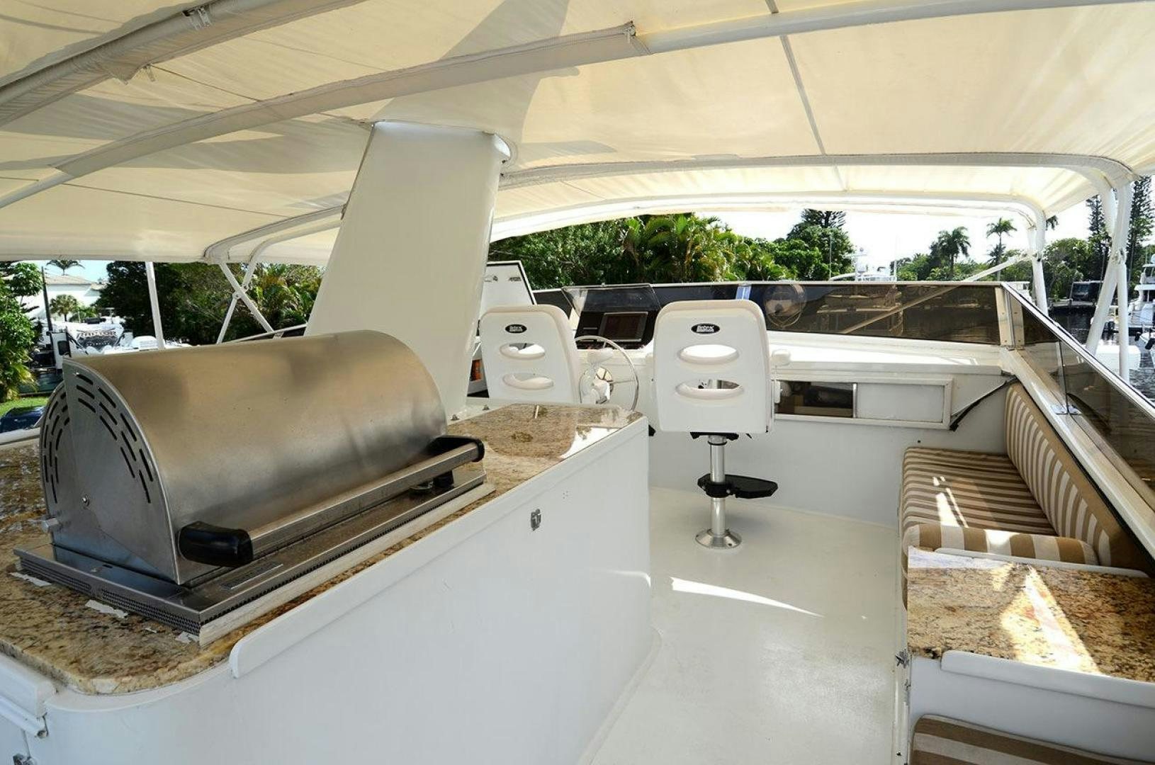 a car with a large wheel aboard GOLDEN GIRL Yacht for Sale