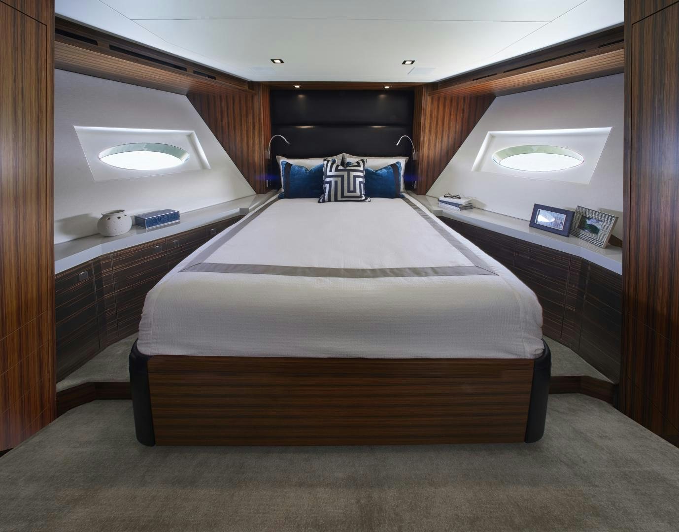 a bed in a room aboard M90 PANACERA Yacht for Sale