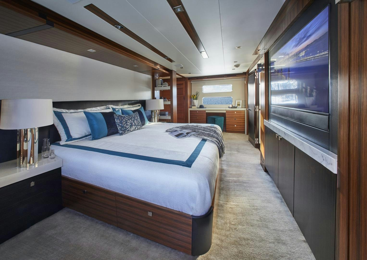 a bedroom with a large bed aboard M90 PANACERA Yacht for Sale