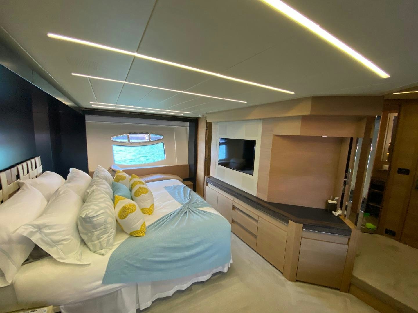 a room with a bed and a television aboard NO NAME Yacht for Sale