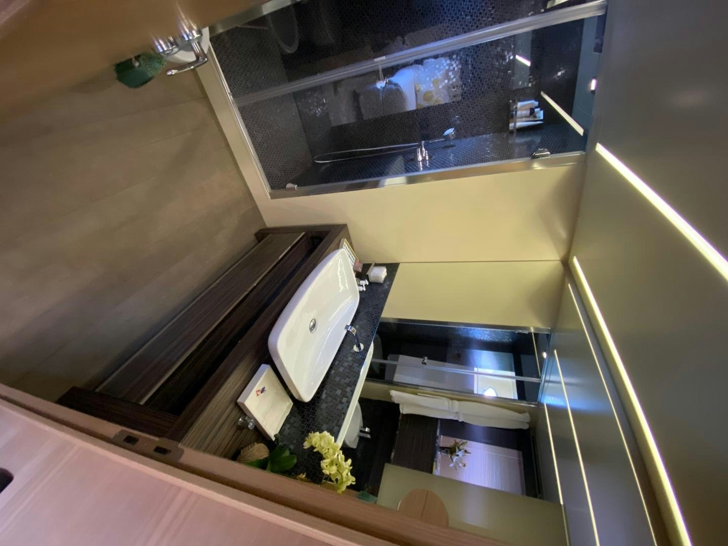 a kitchen with a large mirror aboard NO NAME Yacht for Sale