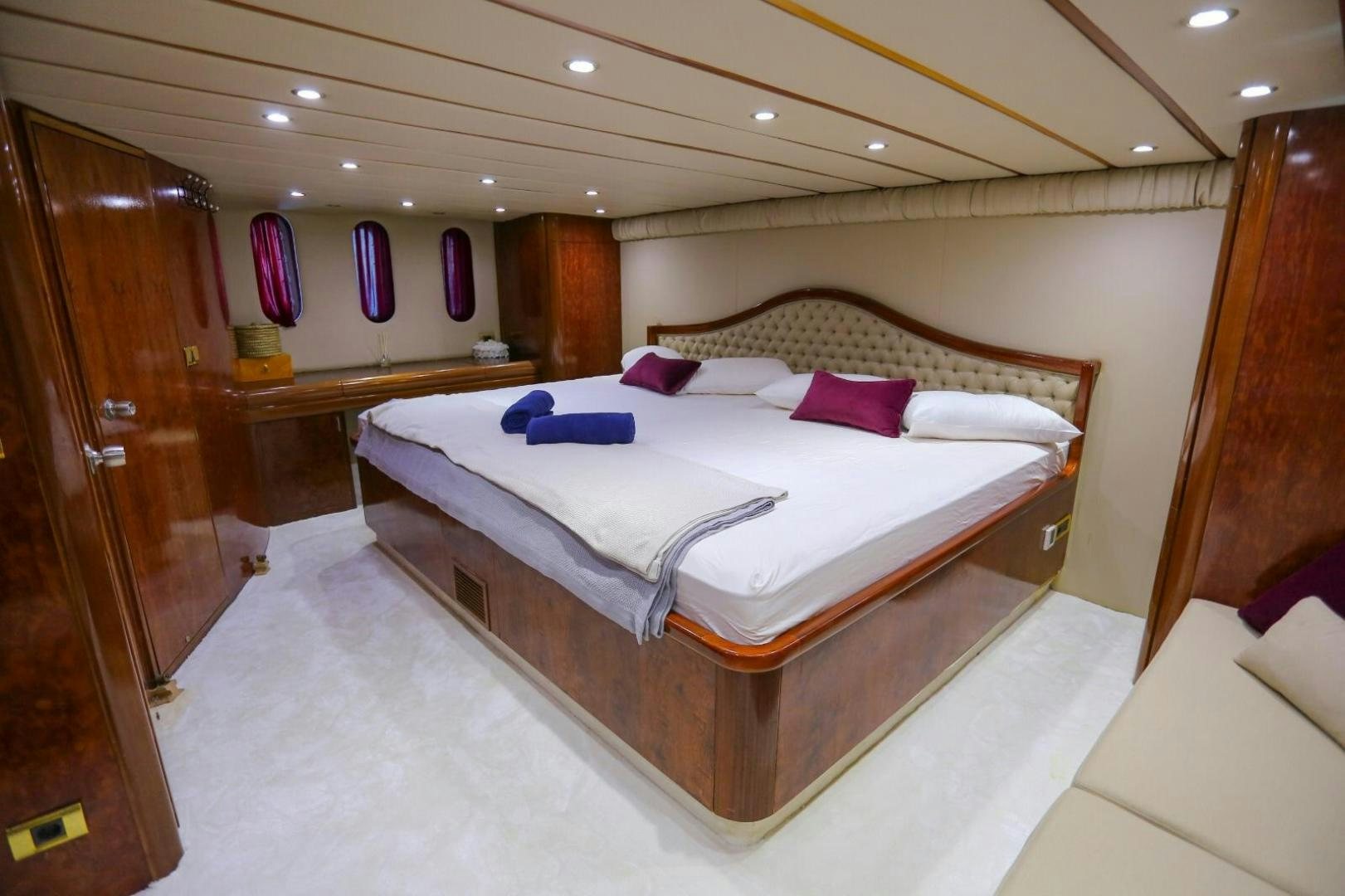 a room with a bed and a closet aboard NO NAME Yacht for Sale